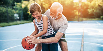 granddad_playing_basketball_grandson