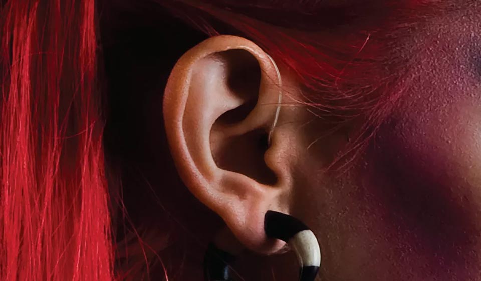 Image of ear and red hair
