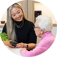 selma_rosie_audiologist_showing_hearing_aids