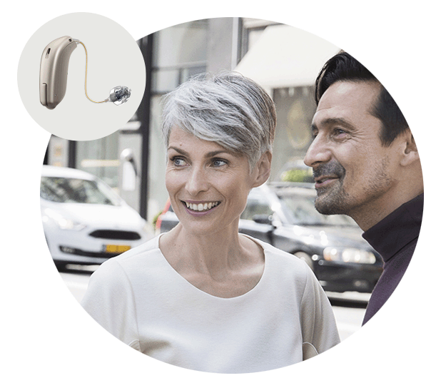 Image shows man wearing Oticon Opn hearing aid 