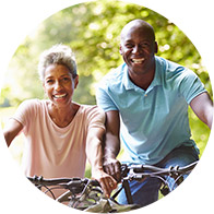 Image shows couple cycling
