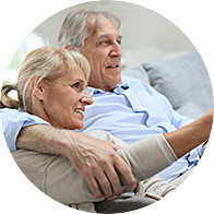 Image shows couple watching tv